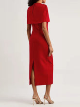 Red dress with a slit- back view